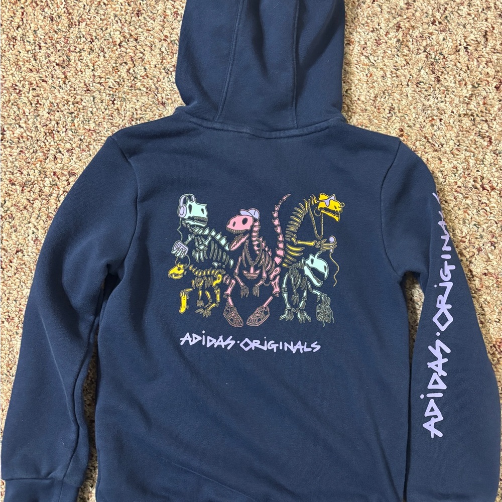 ⬇️ Adidas Originals Kids Navy Hoodie with Dinosaur Print